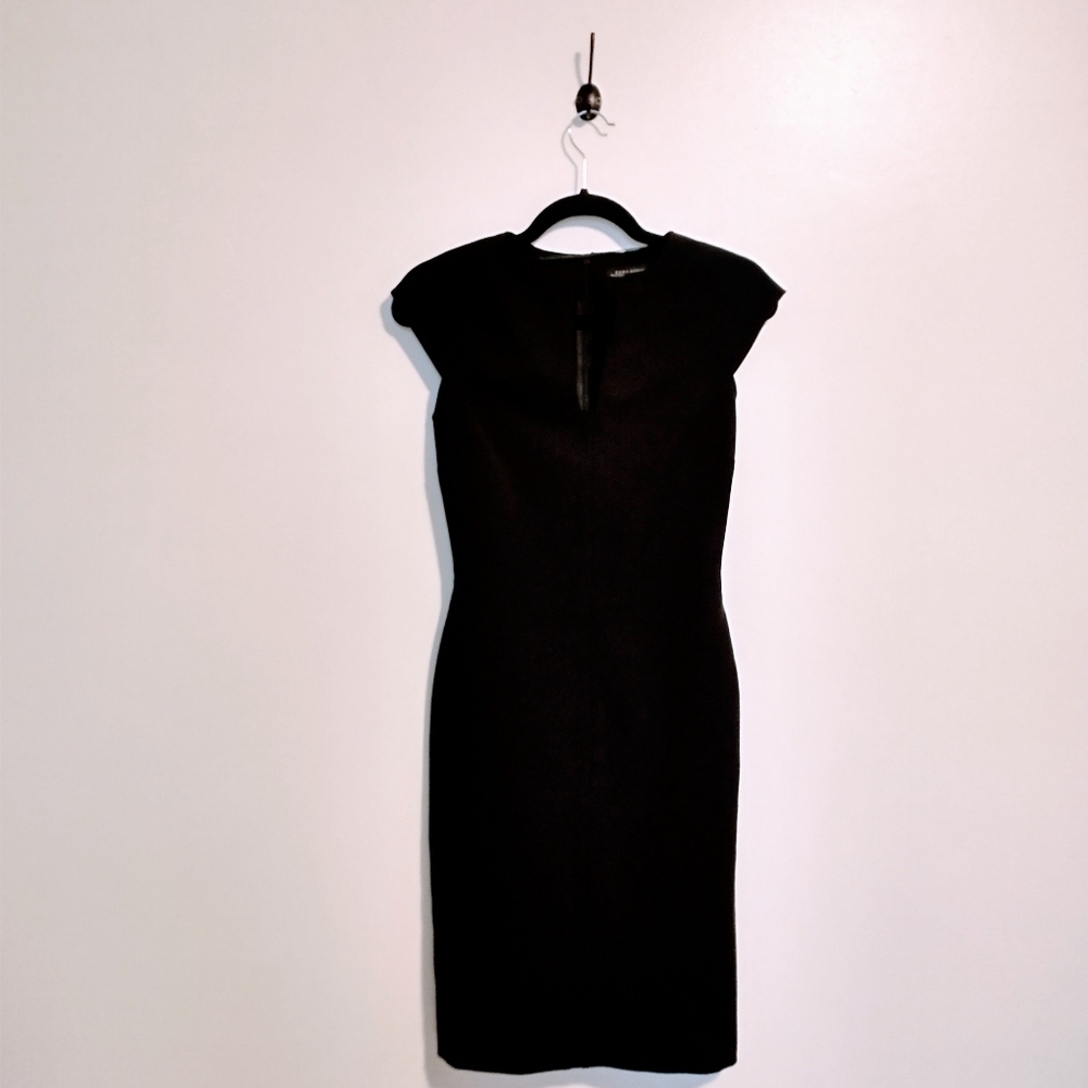 Zara Little Black bodycon dress with deep v neck and cap sleeves. Size xs. Zipp